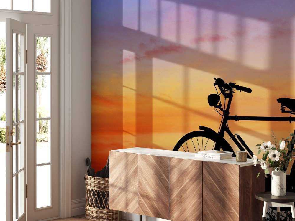 Vintagecykel ved solnedgang