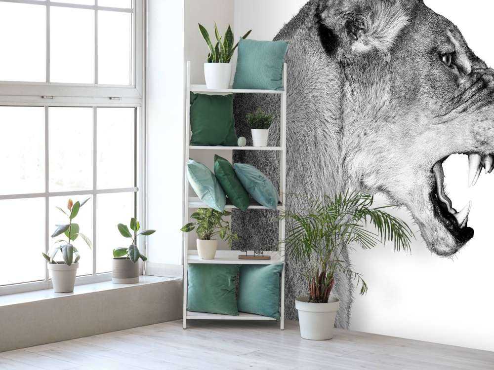 Løvinnen sett fra siden, hvit