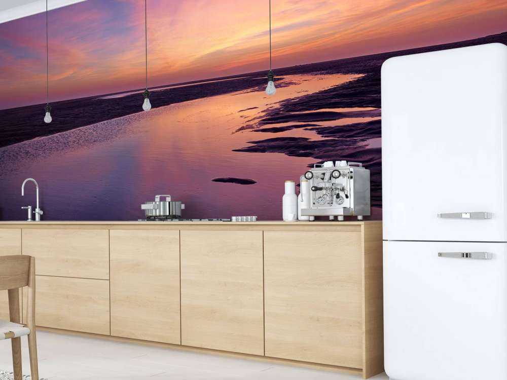 Solnedgang med lilla luft