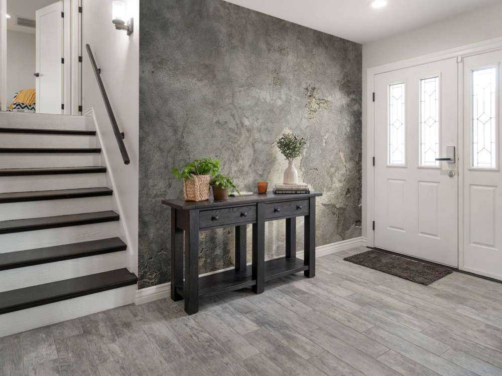 Sprucken betong med stuckatur