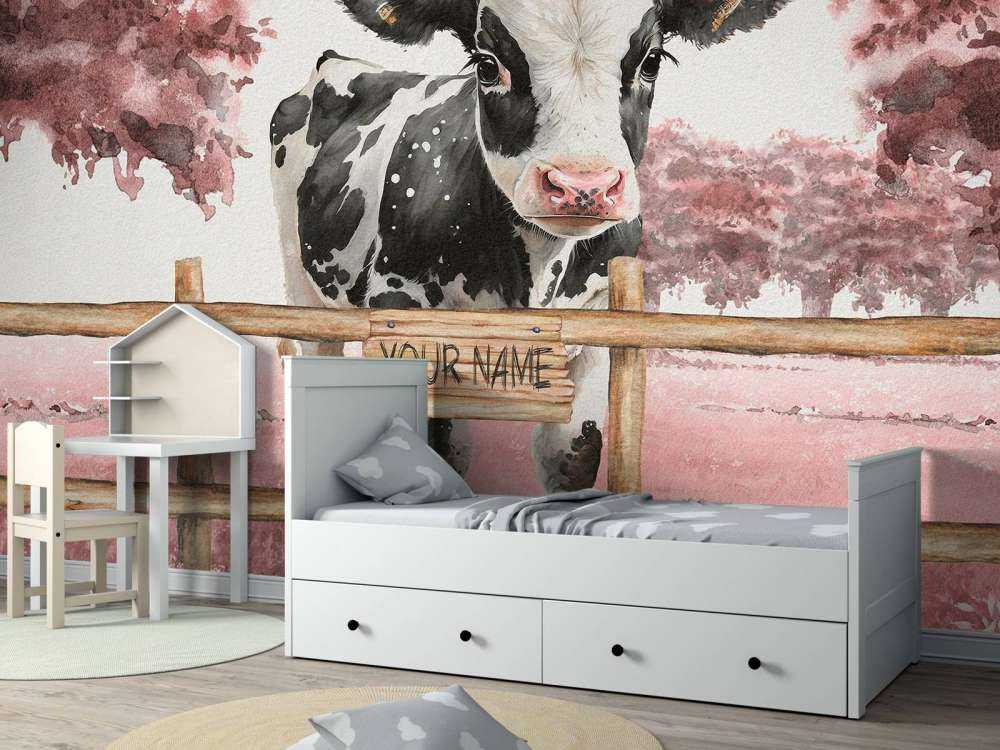 Ung ko på en äng rosa