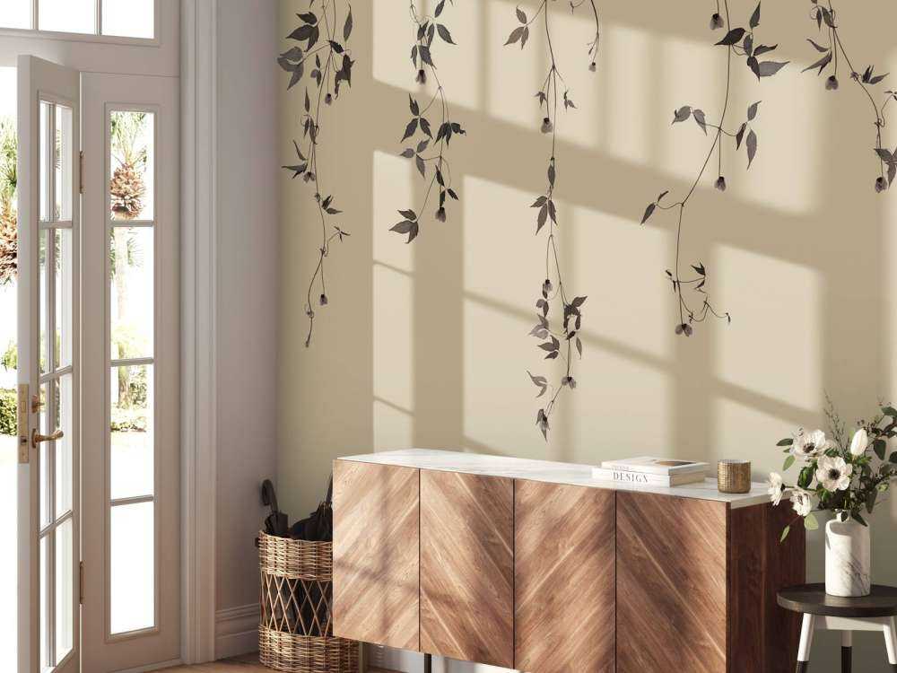 Klematis kvistar på beige