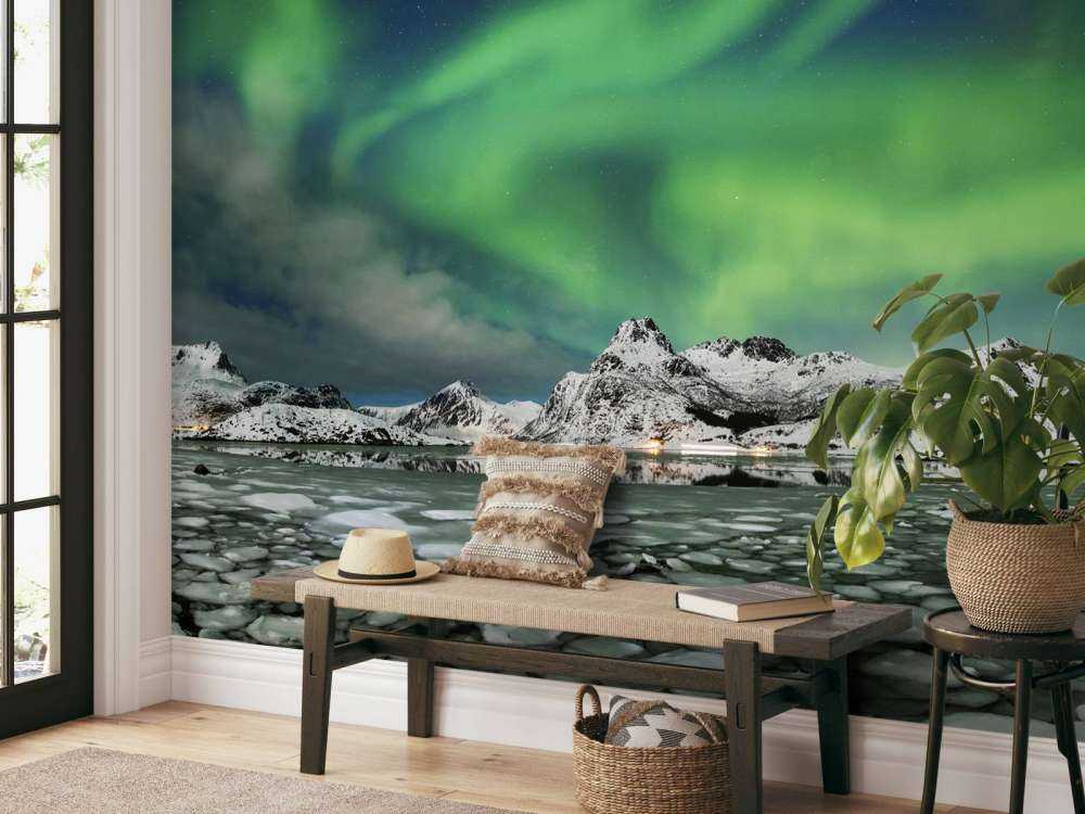 Nordlys over vinterlandskab