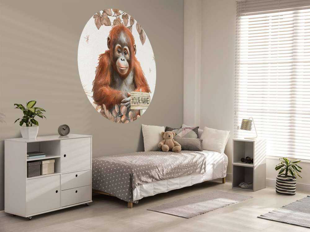 Ung orangutang i jungelen, taupefarget