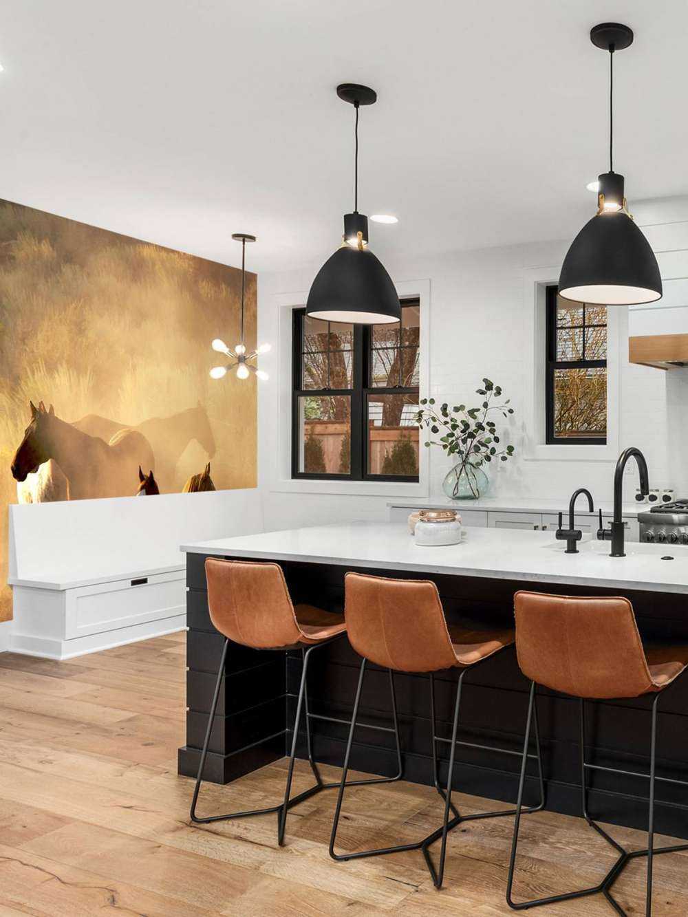 Heste under en solnedgang