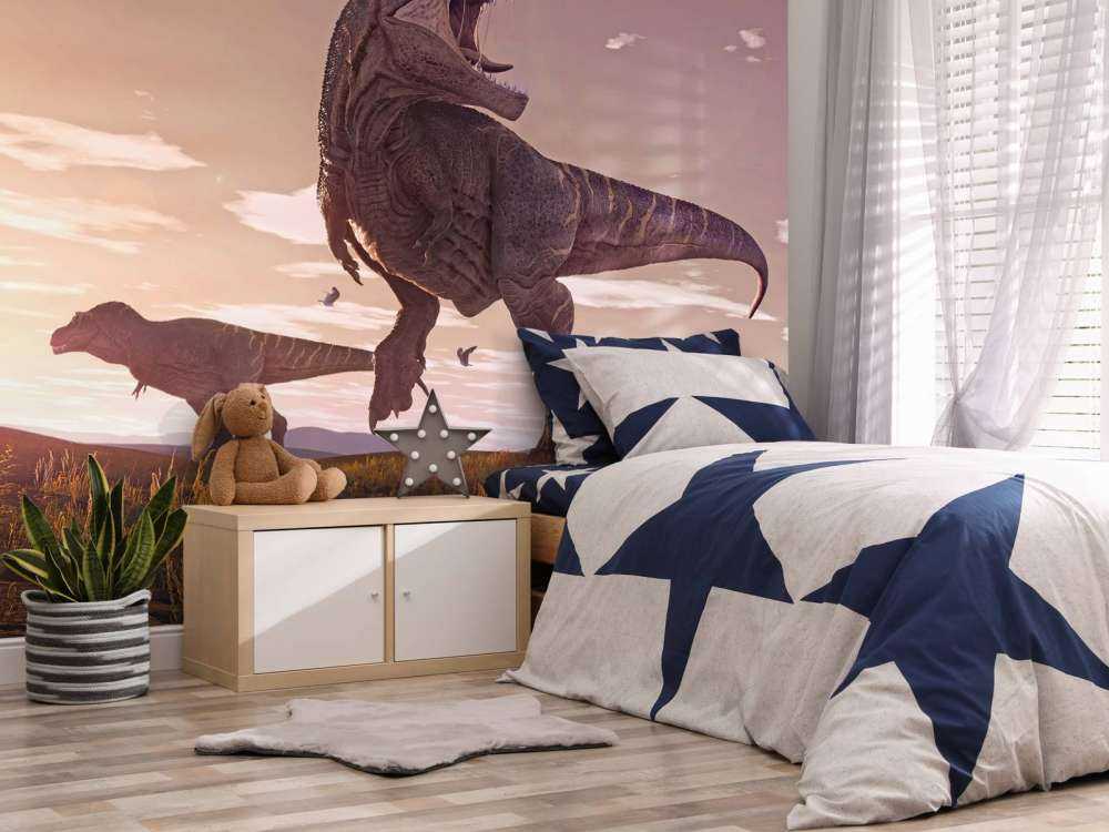 Två Tyrannosaurier i ett fält