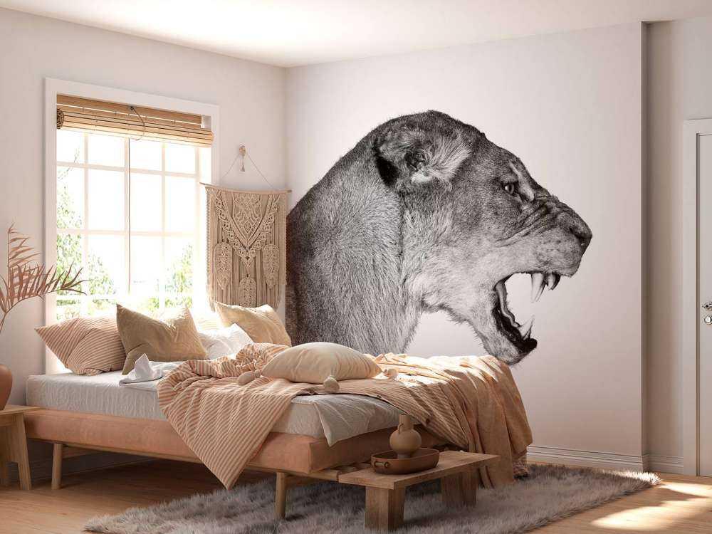 Løvinnen sett fra siden, hvit