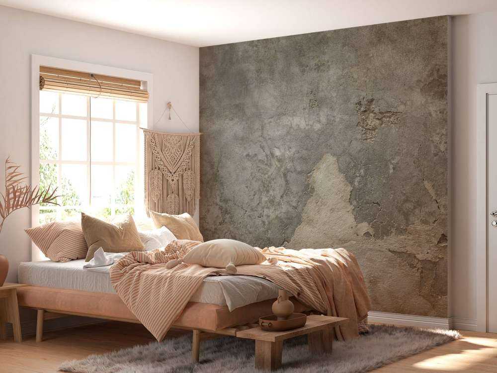 Sprucken betong med stuckatur