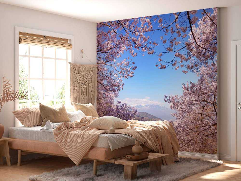 Rosa blommor med berg