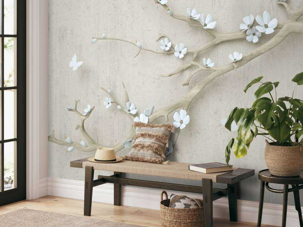 Gren med vita blommor på träbakgrund