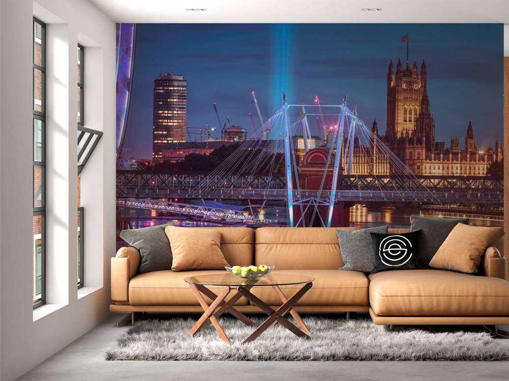 Night view of the London Eye, Golden Jubilee bridge and Westminster, London, UK