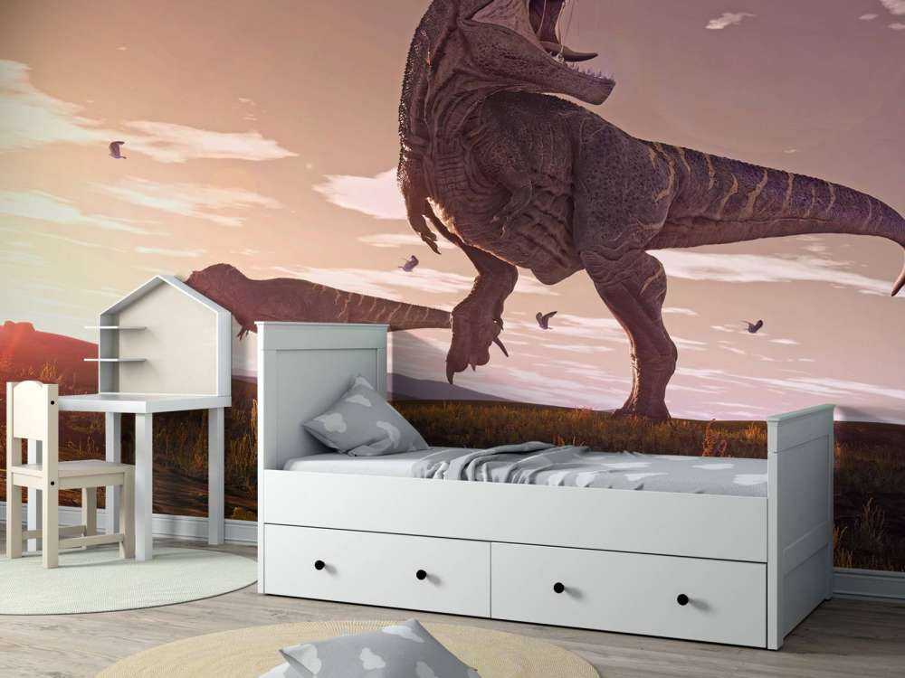 Två Tyrannosaurier i ett fält
