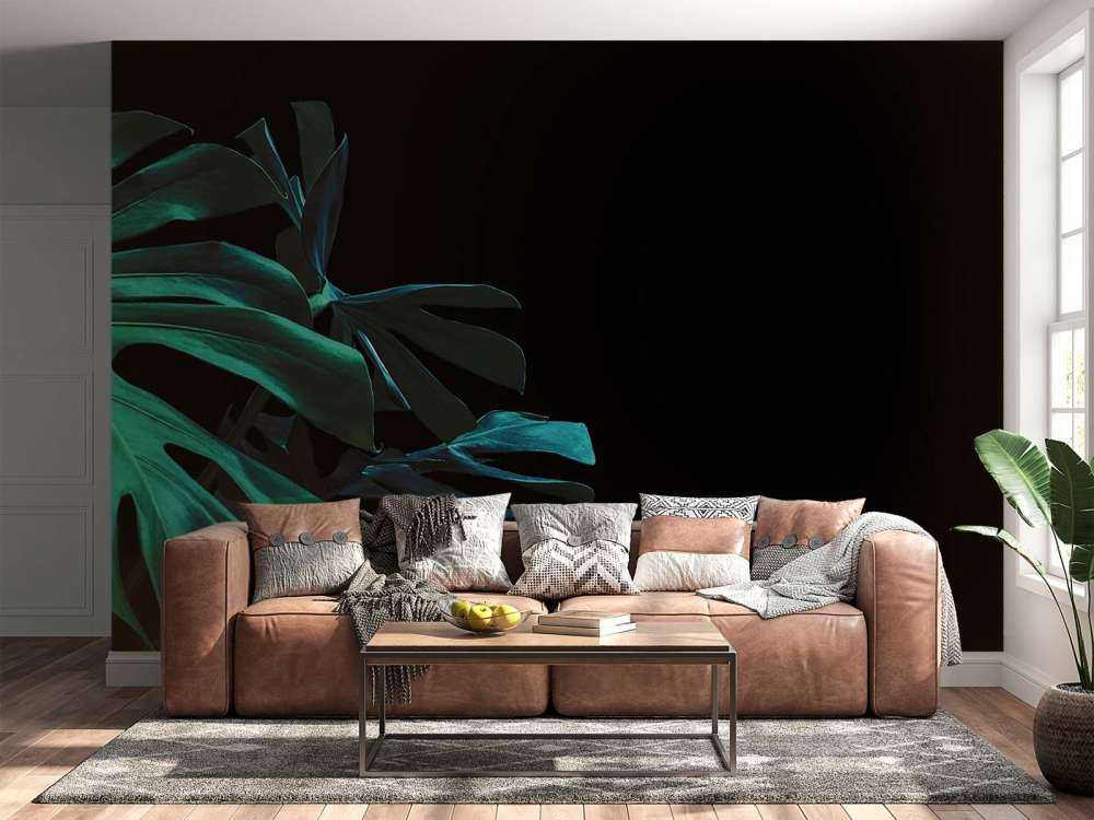 Tropiska löv på svart bakgrund