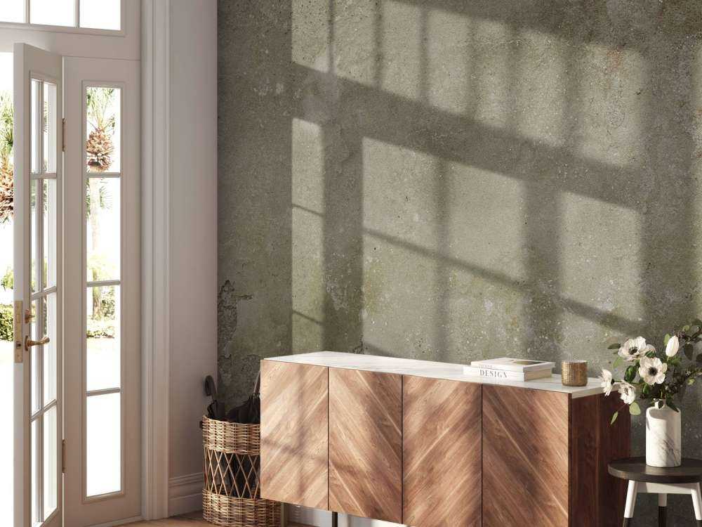 Gammel væg med forvitret stuk