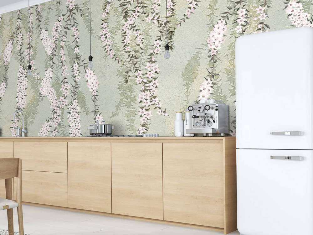 Blomstrende grener på grønn betong