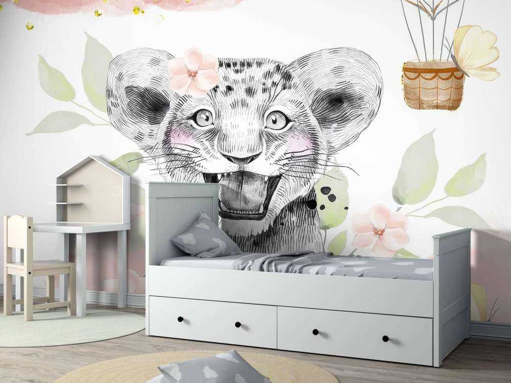 Glad løveunge og luftballon