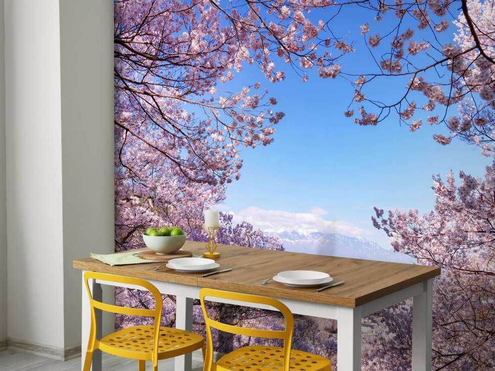 Rosa blomster med fjell