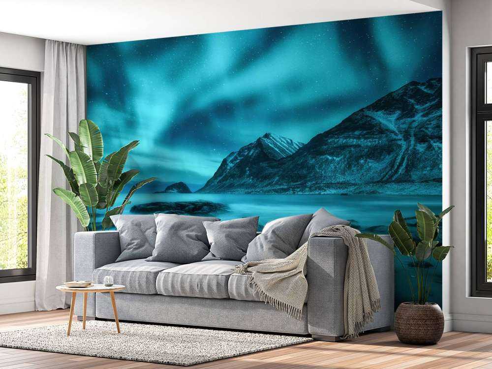 Blå nordlys med fjell