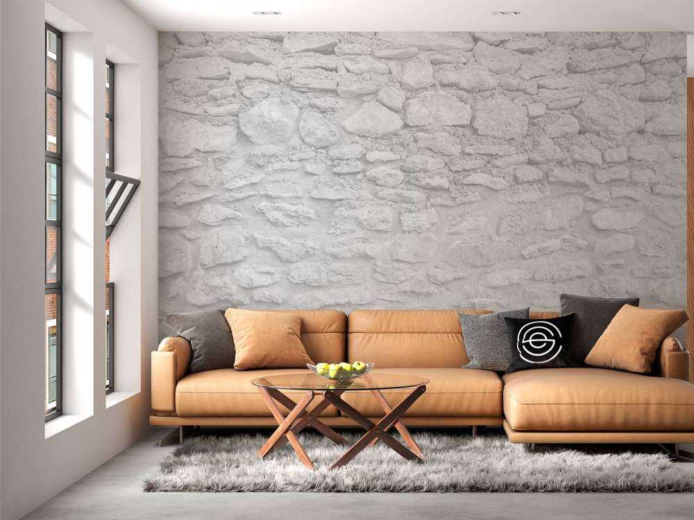 Ljus vägg med grova tegelstenar