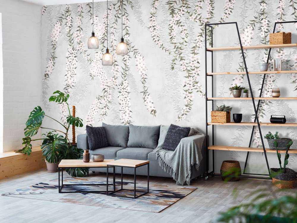 Blomkvistar på ljusblå betong