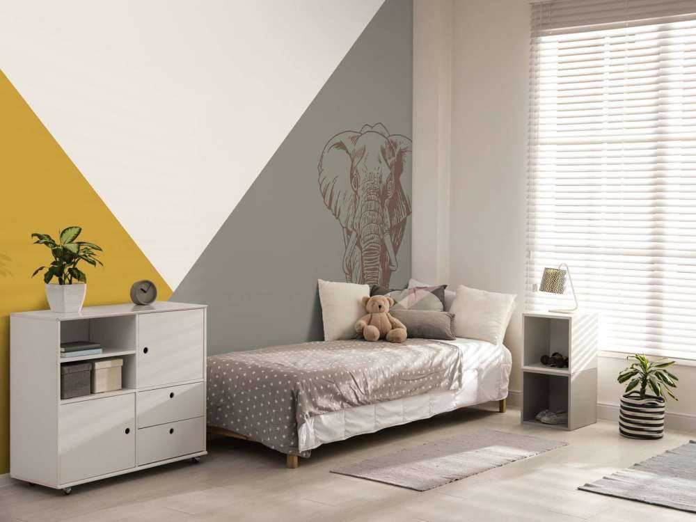 Trianglar i ockergult och grönt med elefant