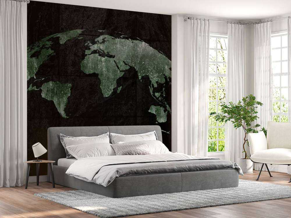 Grön världskarta på betong