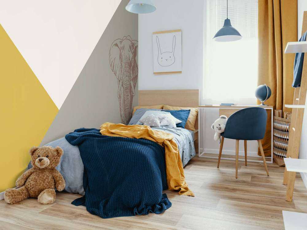 Trianglar i ockergult och grönt med elefant