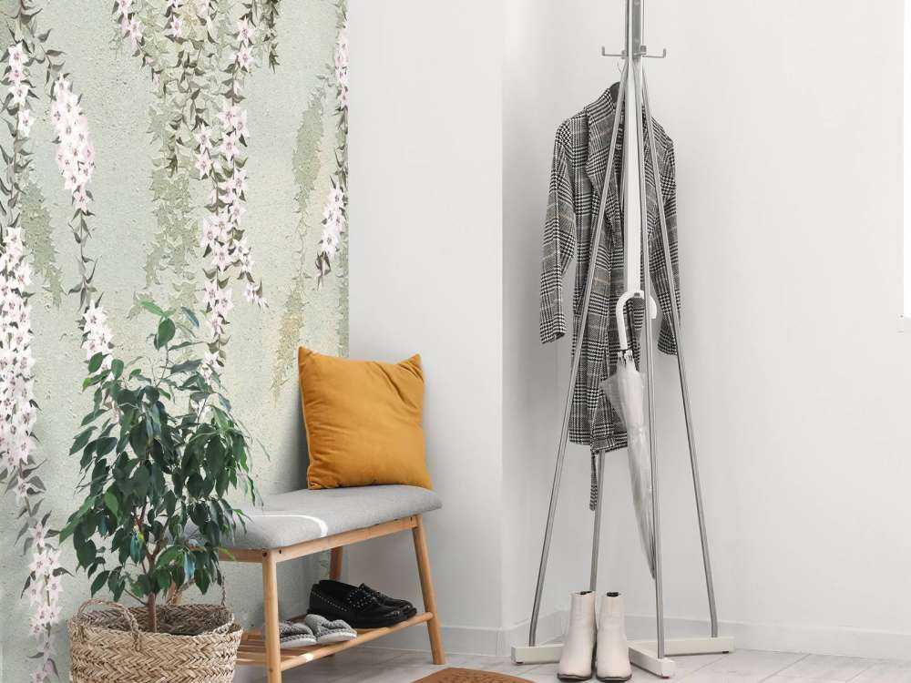 Blomkvistar på grön betong