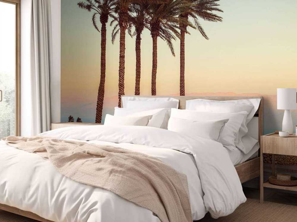 Palmetræer ved solnedgang