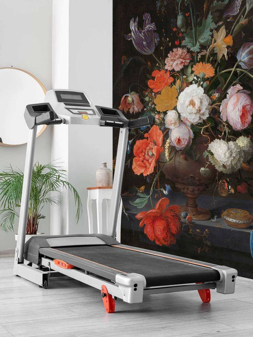 stilleben med blommor och en klocka