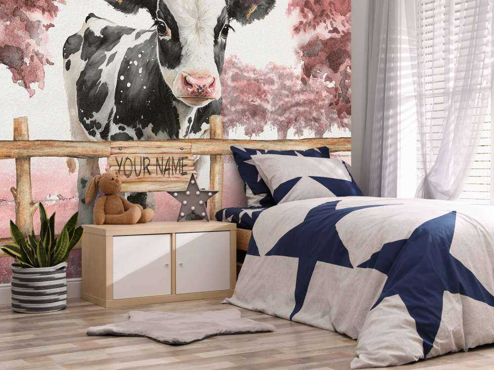 Ung ko på en äng rosa