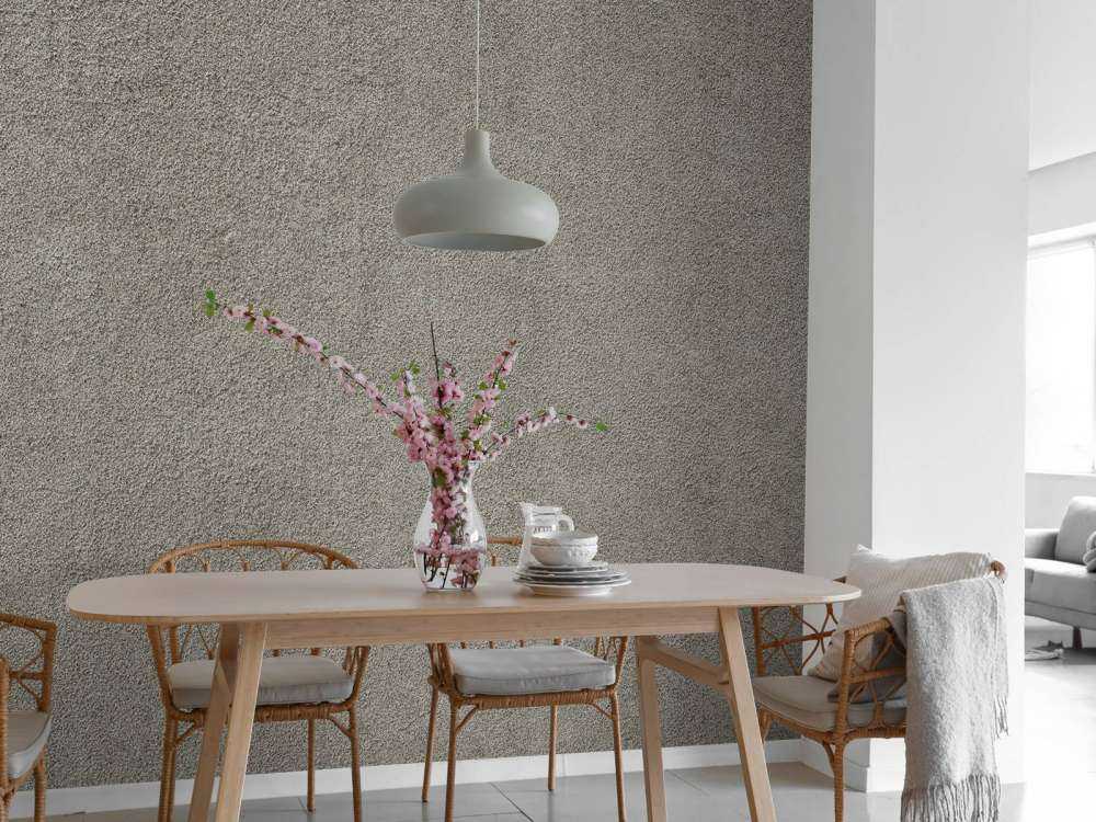 Betongvegg med fine steiner