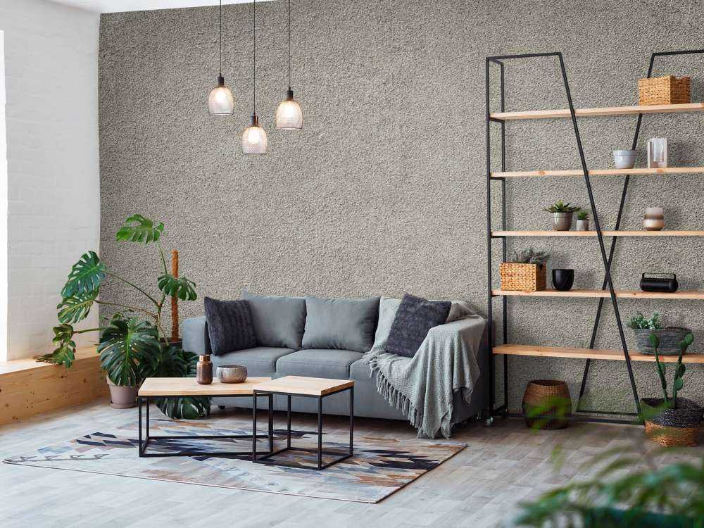 Betongvegg med fine steiner