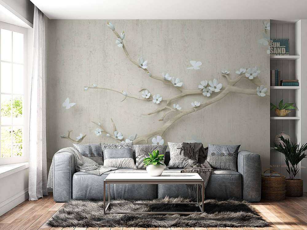 Gren med vita blommor på träbakgrund