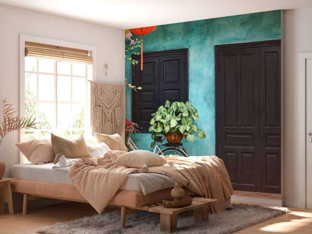 Gammal cykel nära ett hus