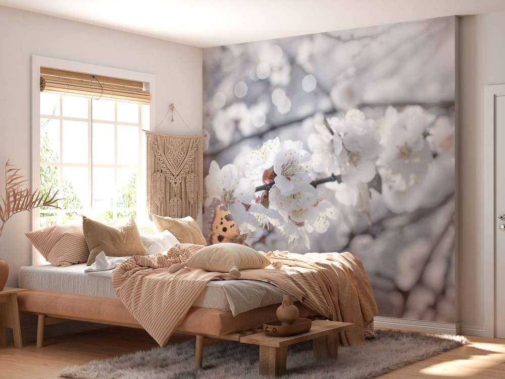 Sommerfugl med hvite blomster