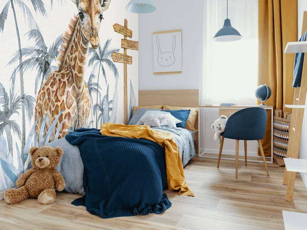 Sjiraffunge i jungelen blå