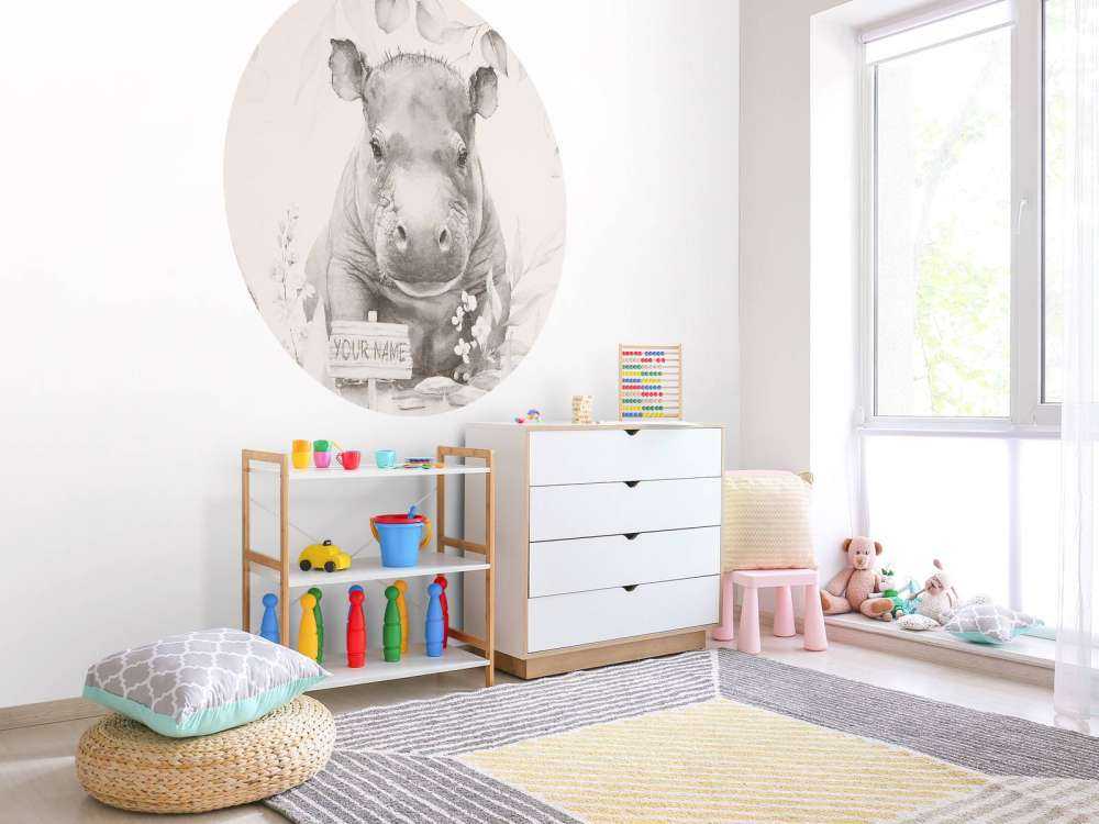 Flodhesteunge i den beige jungle