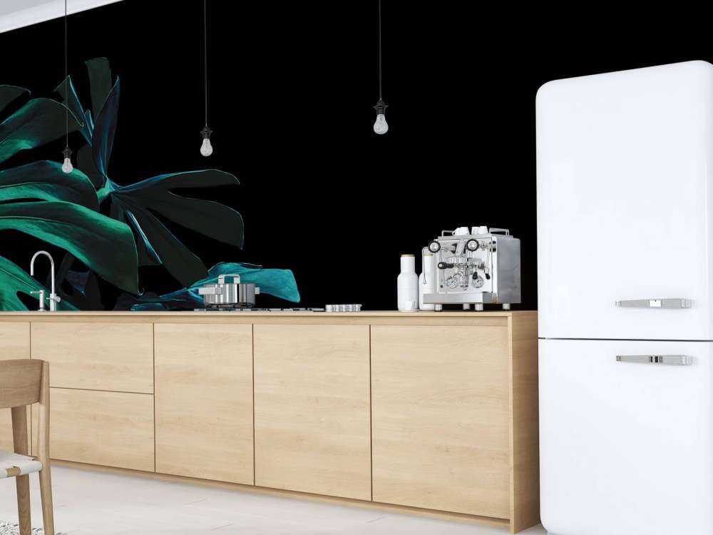 Tropiska löv på svart bakgrund