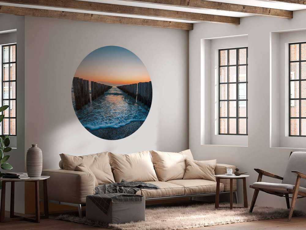 Vågor vid solnedgången