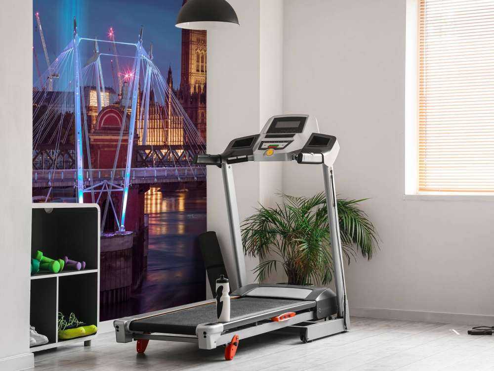 Night view of the London Eye, Golden Jubilee bridge and Westminster, London, UK