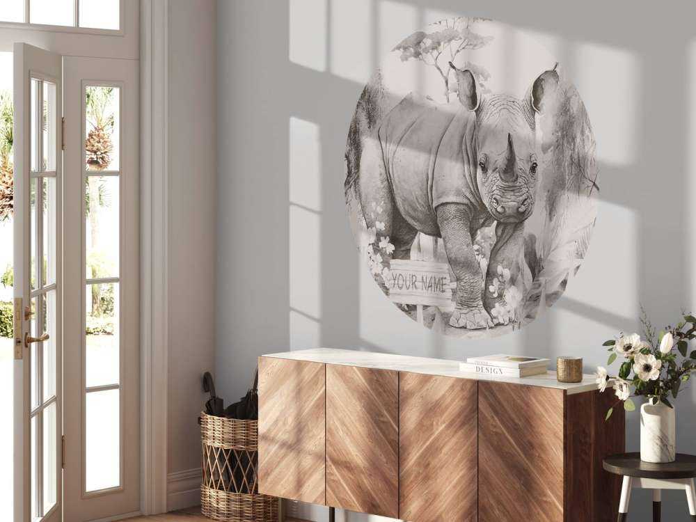 Baby næsehorn på savannen beige