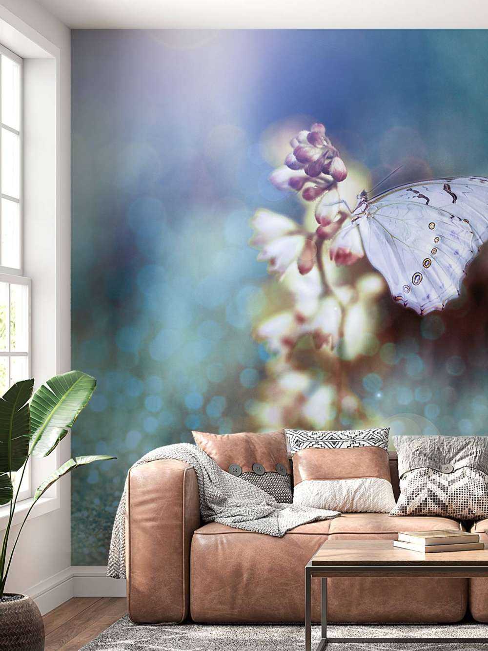 Sommerfugl på blomst