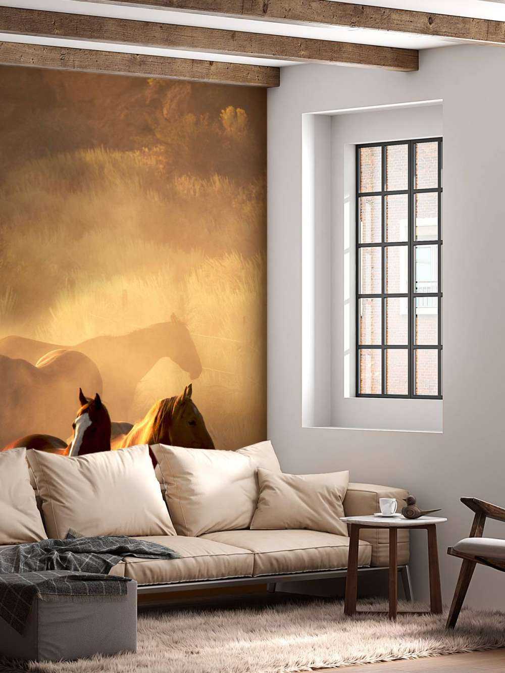 Heste under en solnedgang