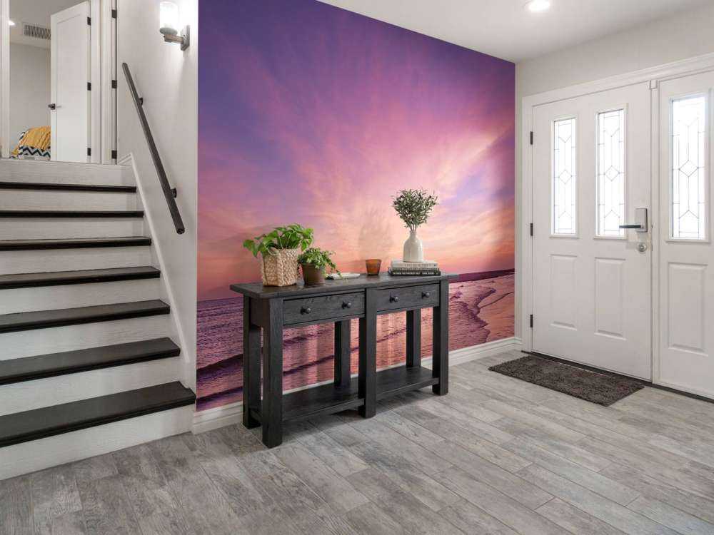 Strand med rosa solnedgang