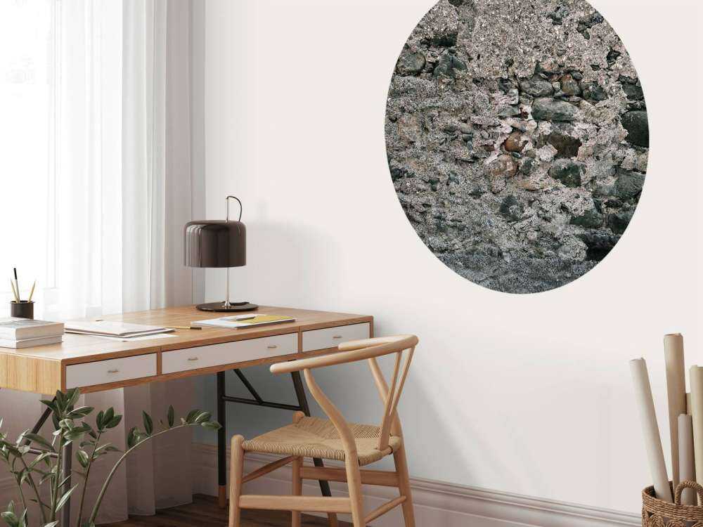 Mur med gamle store steiner