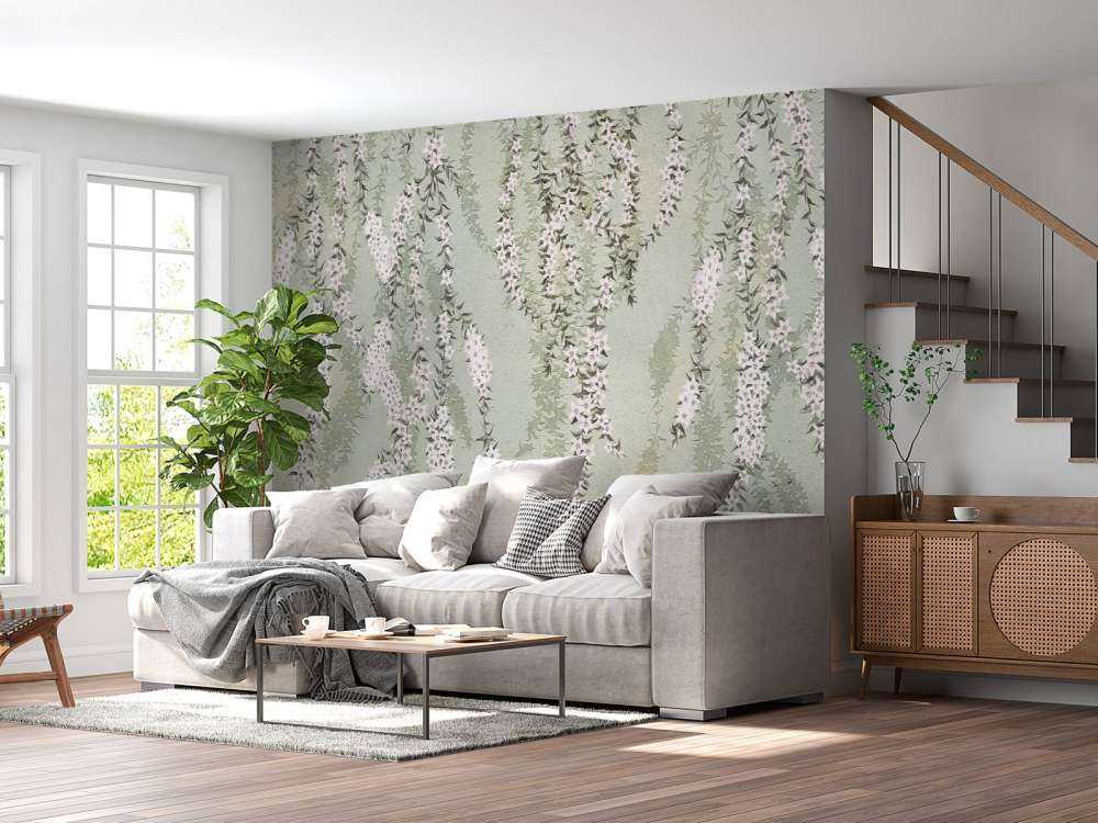 Blomstrende grener på grønn betong