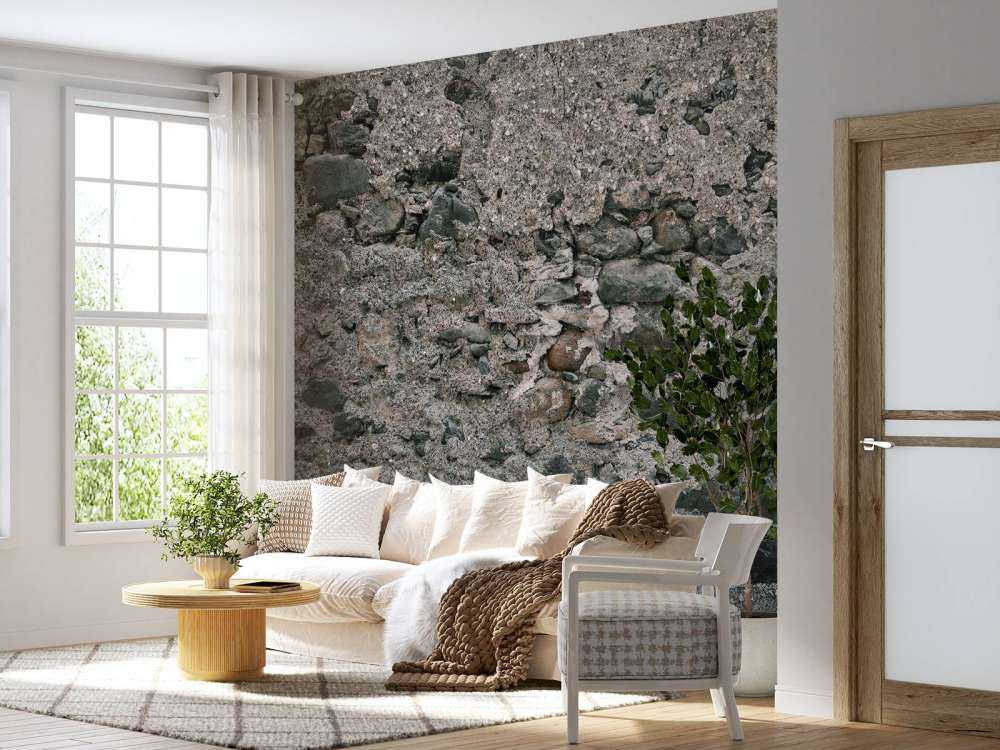 Mur med gamle store steiner