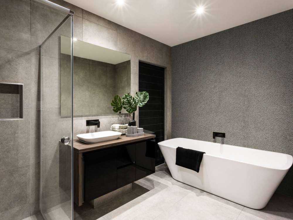 Betongvegg med fine steiner