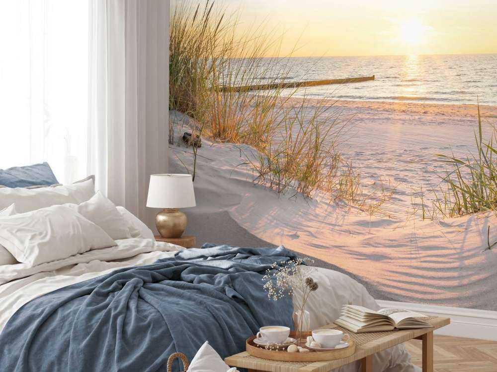 Klitstrand med solnedgang